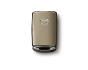 Capac cheie Zircon Sand Mazda original, compatibil CX - 30, CX - 60 si CX - 5 - CarFun.ro - Accesorii Originale