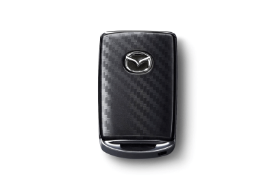 Capac cheie aspect fibra de carbon Mazda original, compatibil CX - 30, CX - 60, CX - 80 si CX - 5 - CarFun.ro - Accesorii Originale