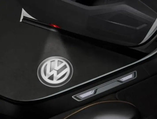 Iluminare LED Volkswagen Original - logo VW pe podea, alb/negru, set 2 bucati - Volkswagen Shop