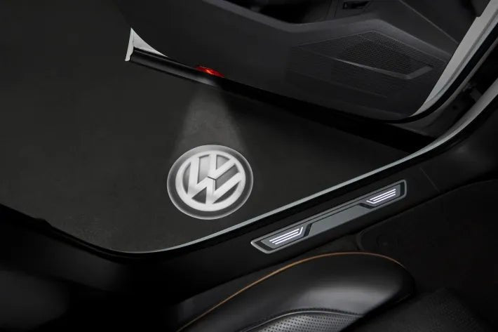 Iluminare LED Volkswagen Original - logo VW pe podea, alb/negru, set 2 bucati - Volkswagen Shop