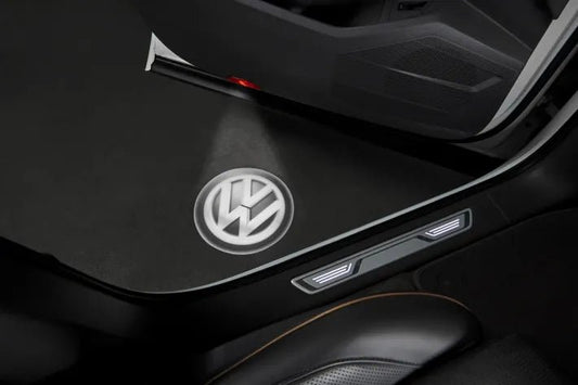 Iluminare LED Volkswagen Original - logo VW pe podea, alb/negru, set 2 bucati - Volkswagen Shop